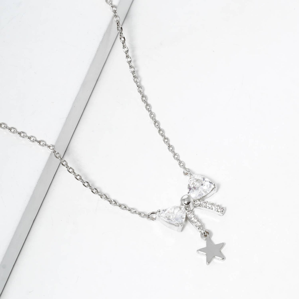 Dainty CZ Bow & Star Pendant Necklace