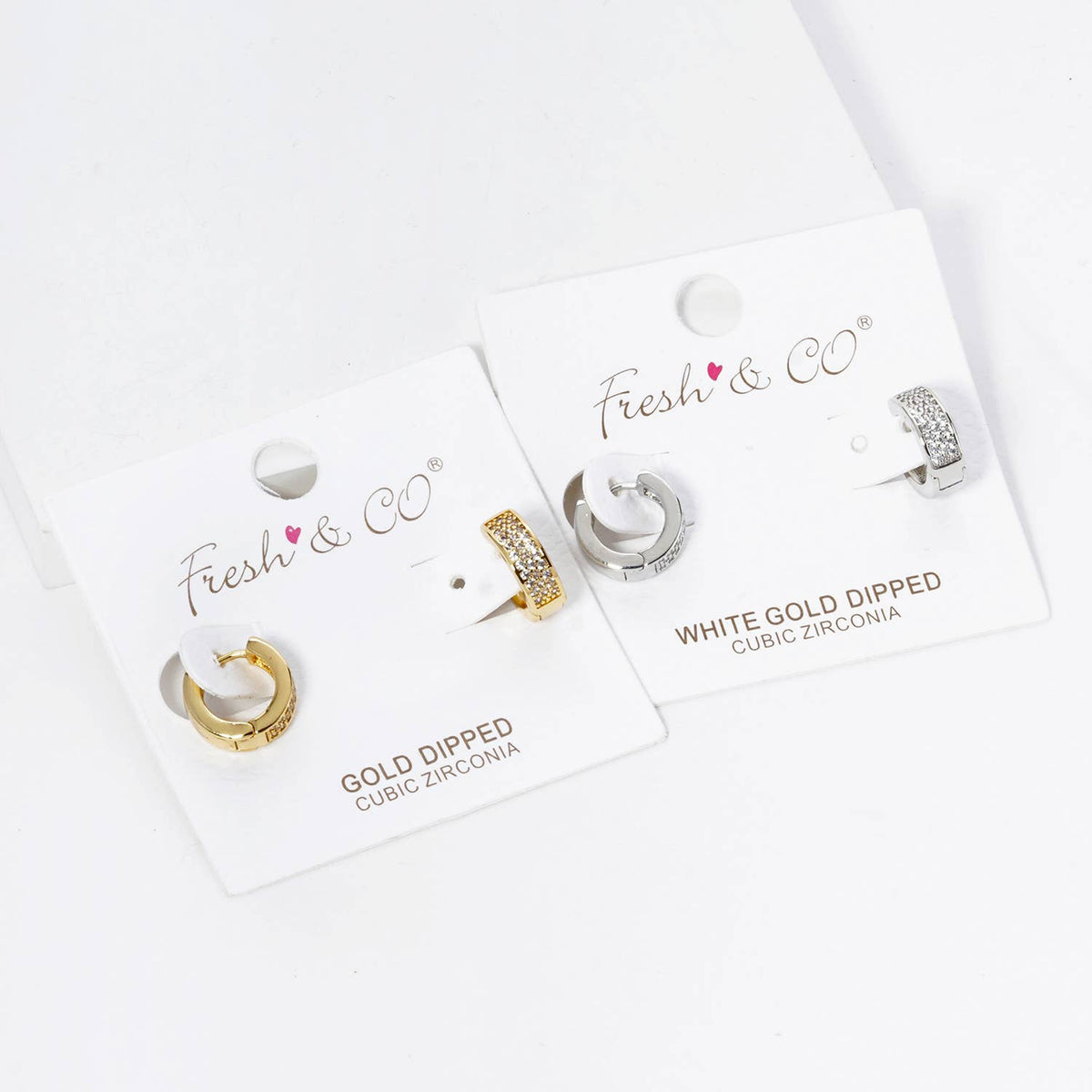 3 LINE MICRO PAVE SET CUBIC ZIRCONIA 10MM HUGGIE HOOP.