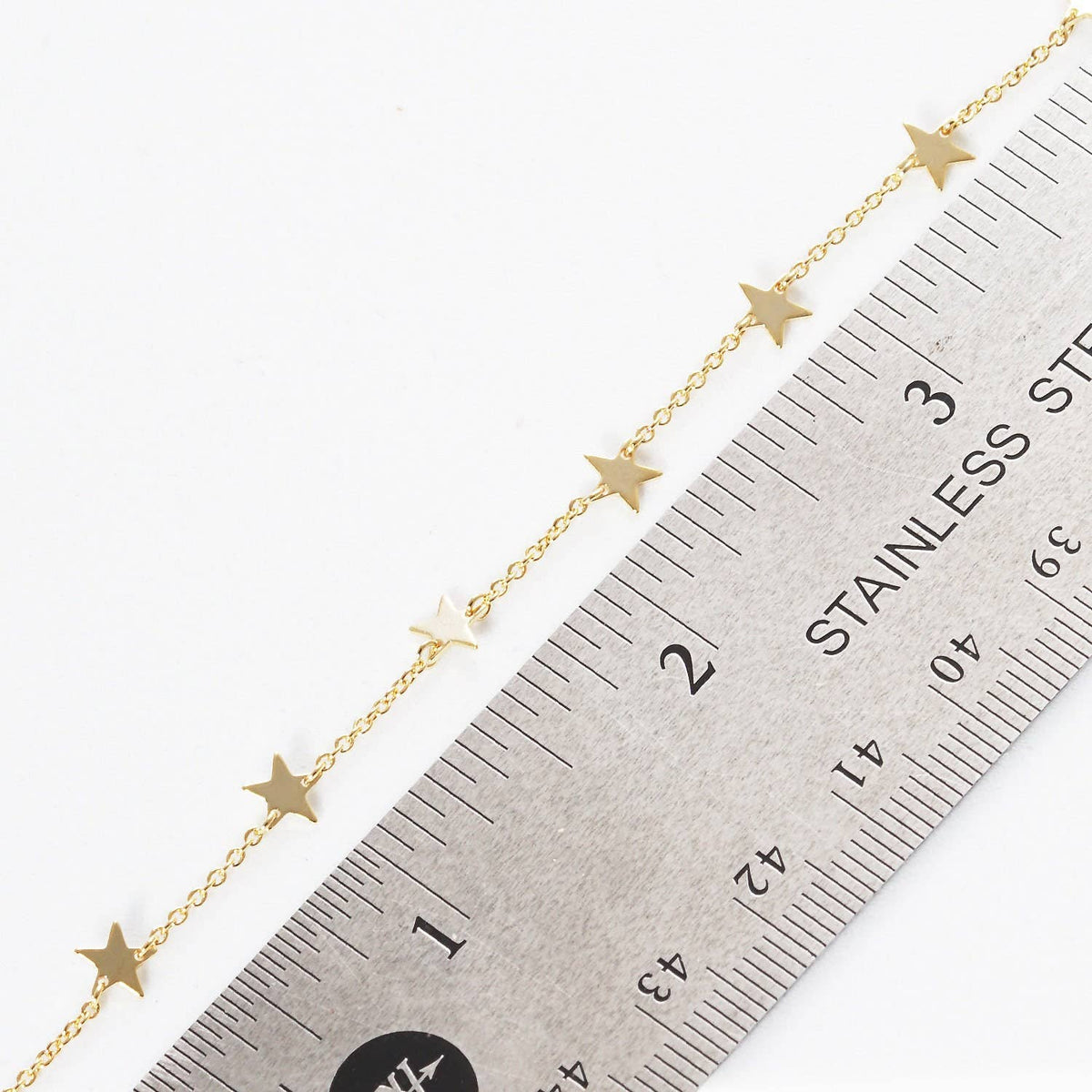 Gold Plated Floating Star Charm Necklace