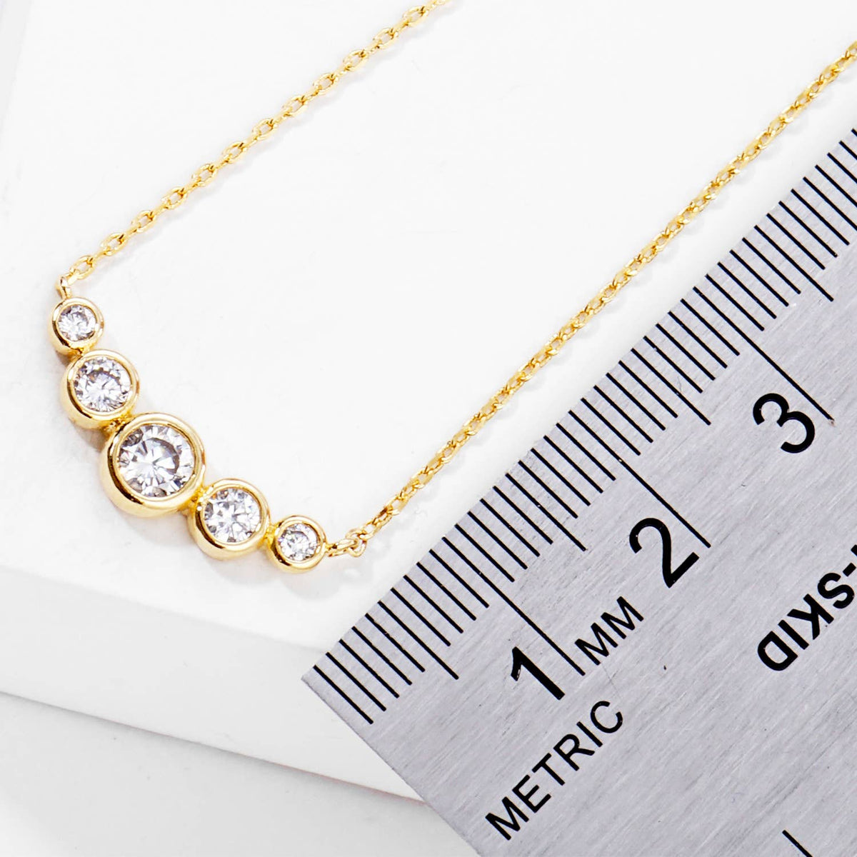 Graduated Five-Stone Bezel CZ Curve Necklace