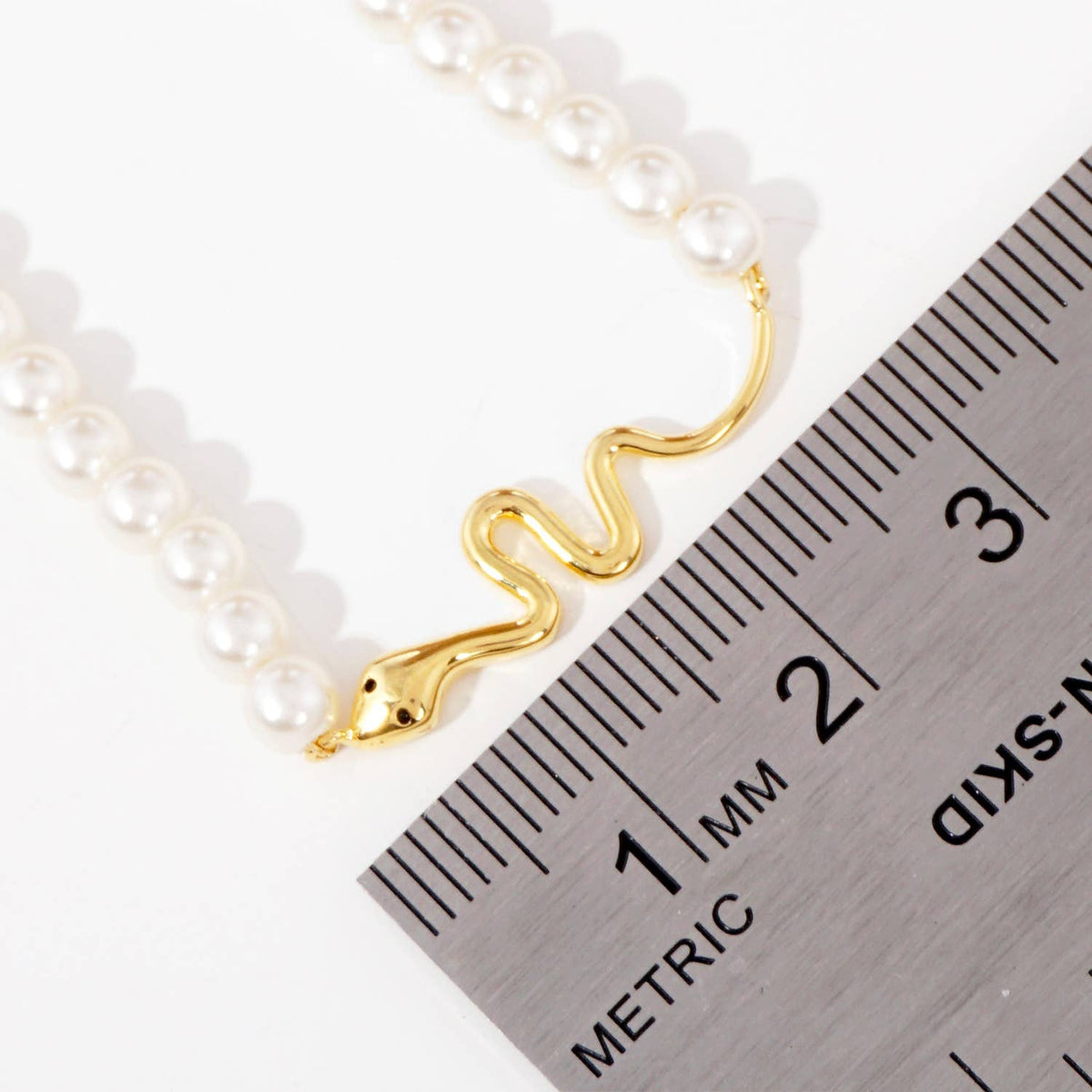 Gold Plated Pearl Serpent Necklace