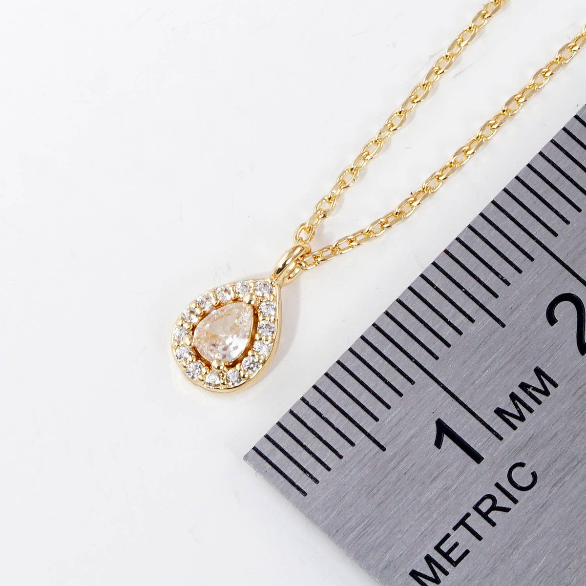 Elegant Pear-Cut Halo Pendant Necklace