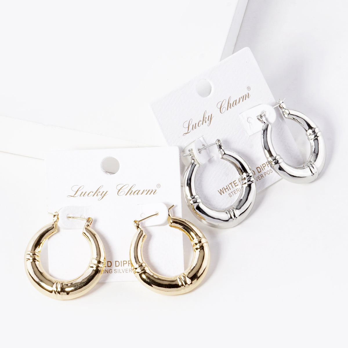 BE365 bamboo-style hoop earrings in gold and silver tones