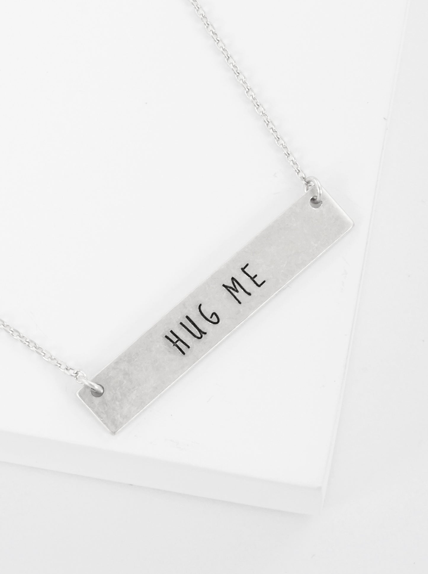 Hug Me Engraved Horizontal Bar Pendant Necklace