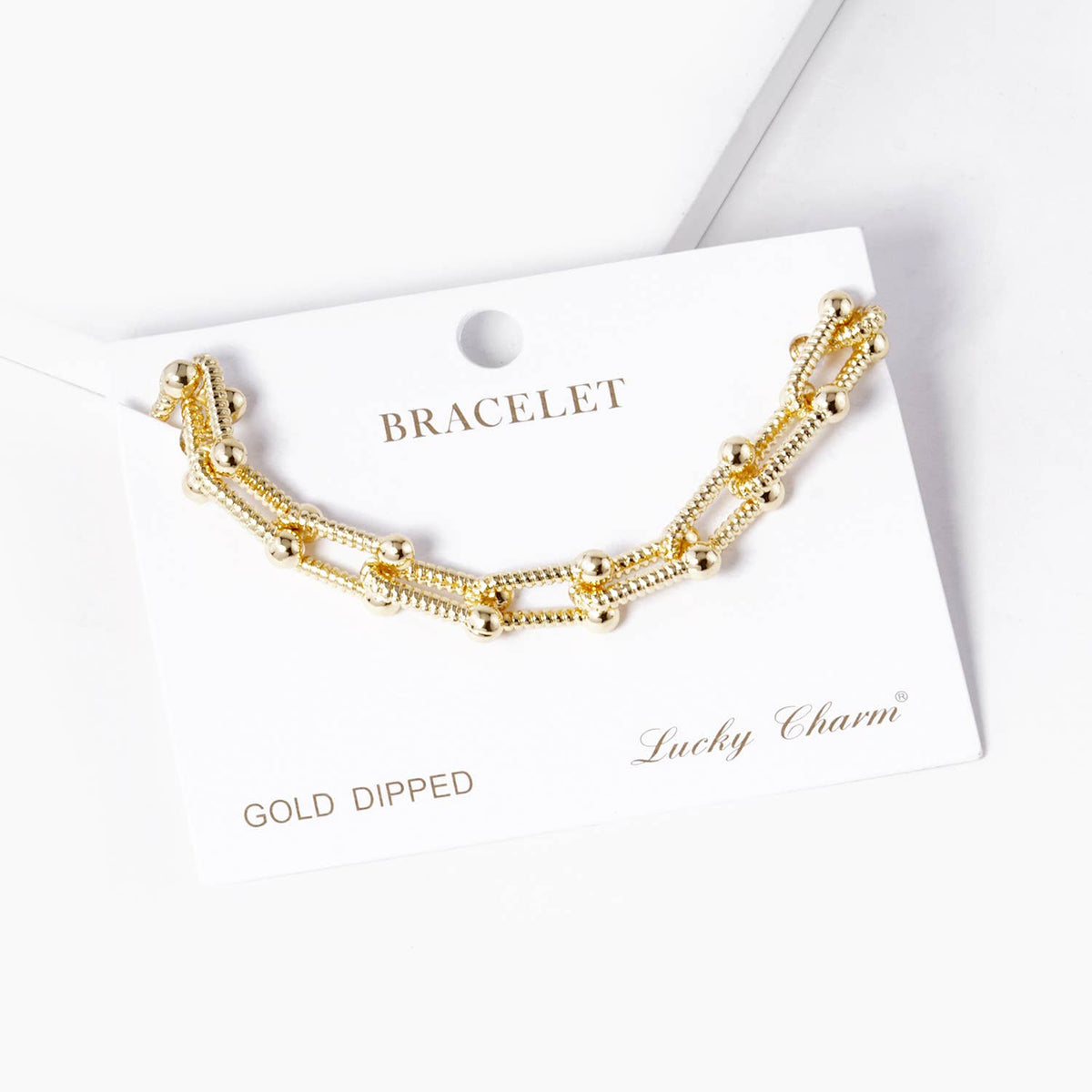 Modern U-Link Statement Bracelet with Polished Bead Accents
