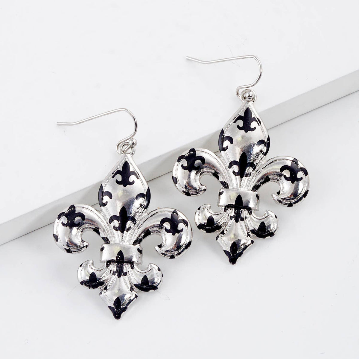 Gold Plated Black Spotted Fleur De Lis Dangle Earrings
