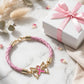 Pink Ribbon Butterfly Bracelet – Gold-Dipped Braided Charm