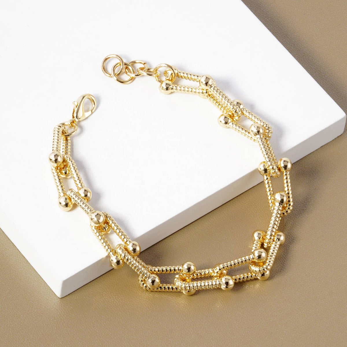 Modern U-Link Statement Bracelet with Polished Bead Accents
