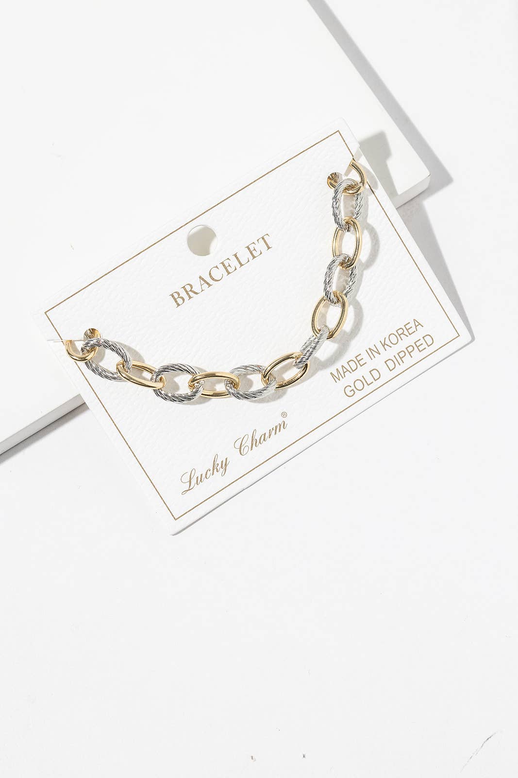 Two-Tone Twisted Oval Link Chain Bracelet
