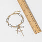 Mixed Metal Cross & Pearl Charm Bracelet
