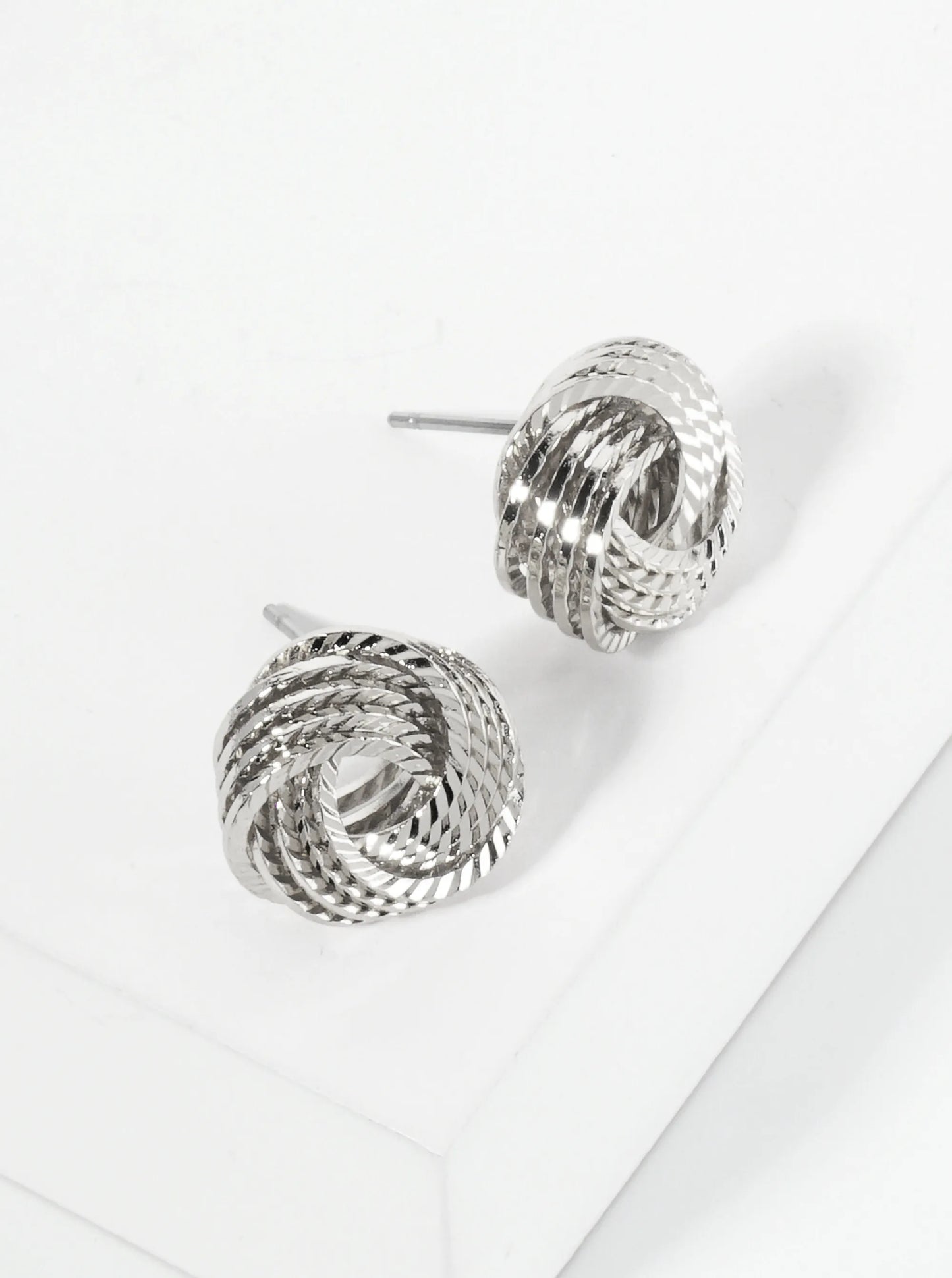 14mm Textured Metal Lightly Flattened Love Knot Stud Earrings