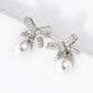 18K Gold Dipped 7mm Pearl Drop Micro Pave Set Cubic Zirconia Ribbon Bow Dangle Post Earrings