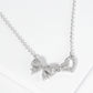 18K Gold Dipped Pave Set Cubic Zirconia Ribbon Heart Pendant Necklace