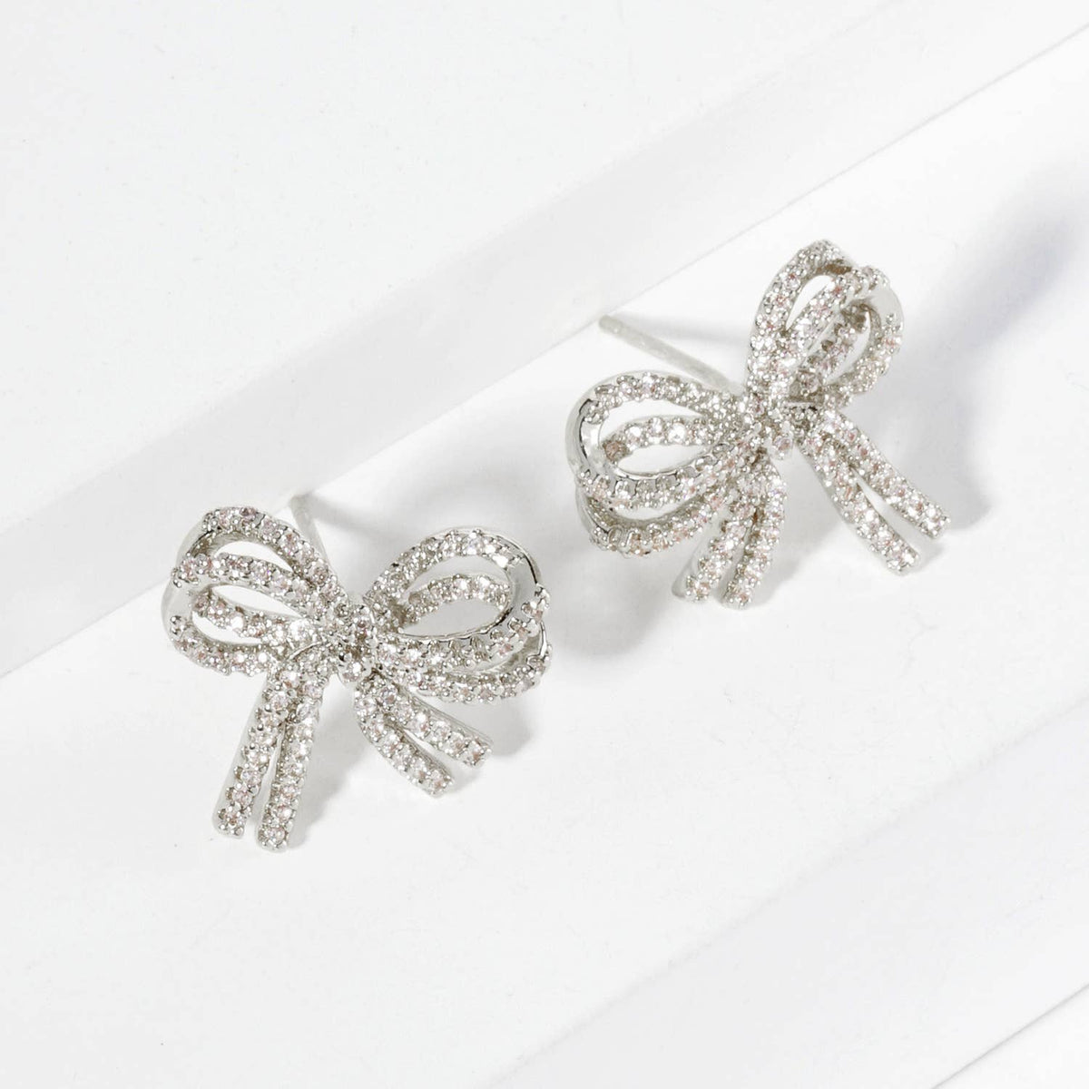 Micro Pave Set Cubic Zirconia Ribbon Bow Stud Earrings