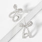 Pave-Set CZ 15mm Bow Open Huggie Hoop Earrings