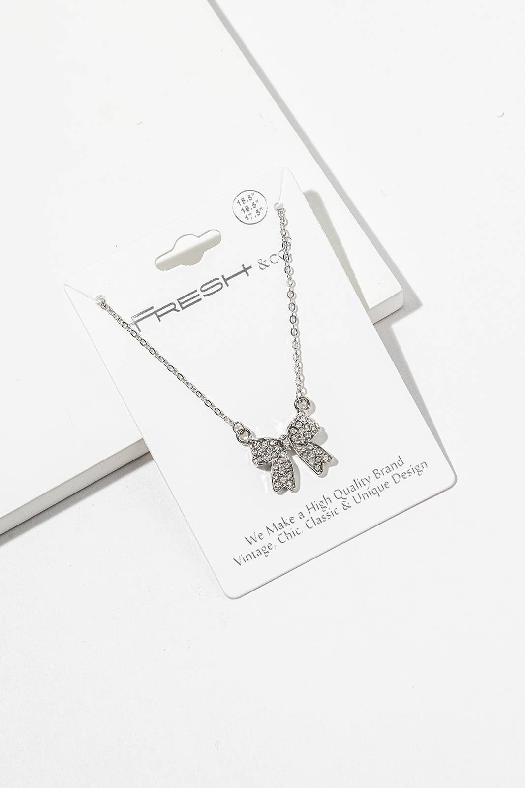 Enamel Crystal Bow Pendant Necklace – Pavé Bow on Chain