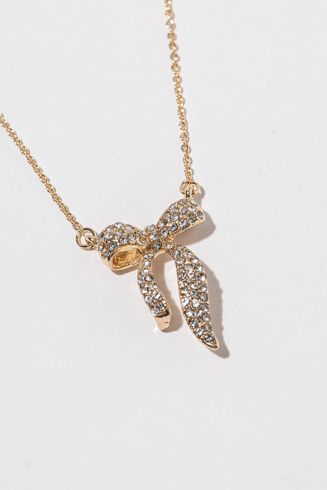 Crystal Ribbon Bow Pendant Necklace – 3D Sculpted Bow