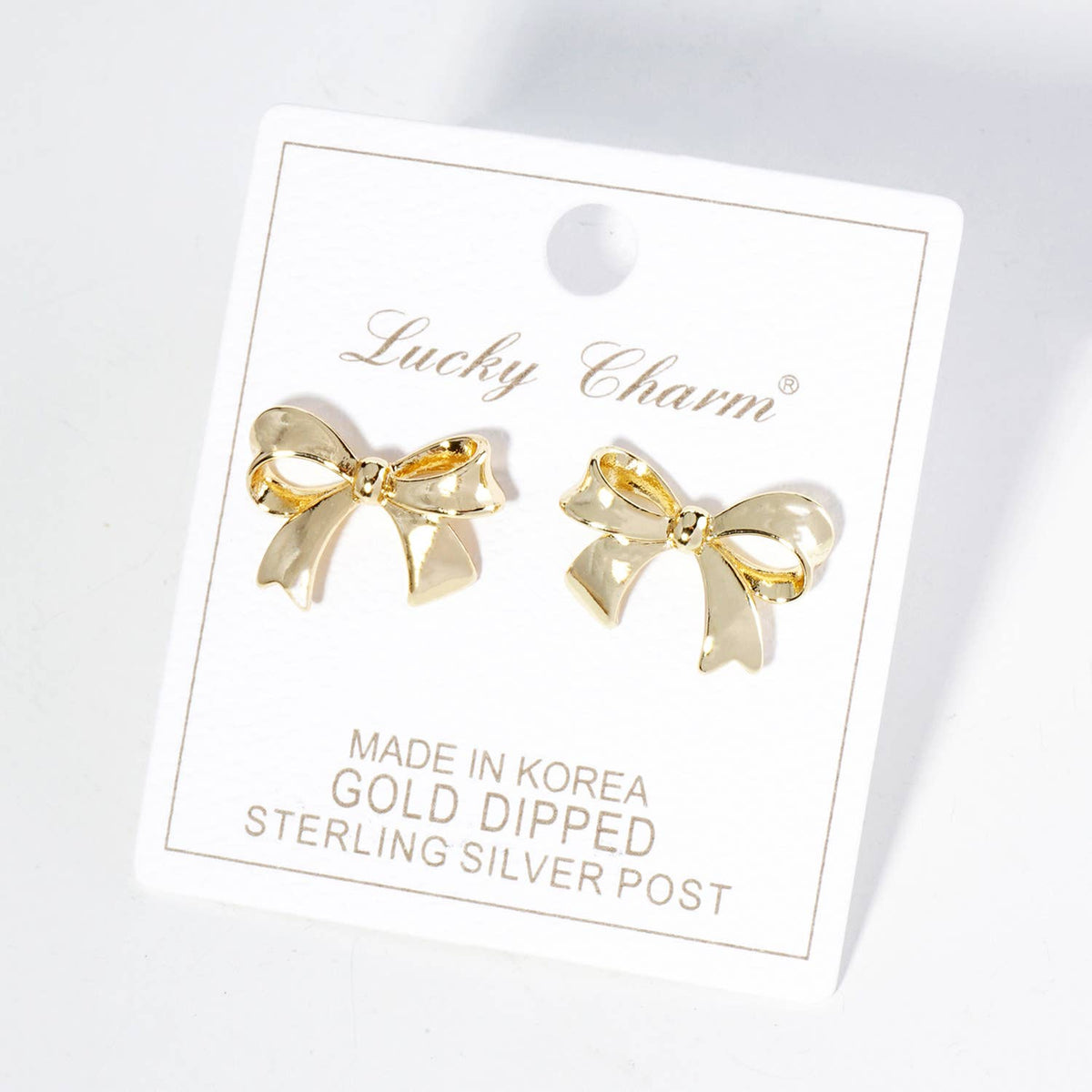 Ribbon Bow Stud Earrings / 18K Gold Dipped Brass.