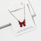 Enamel Crystal Bow Pendant Necklace – Pavé Bow on Chain