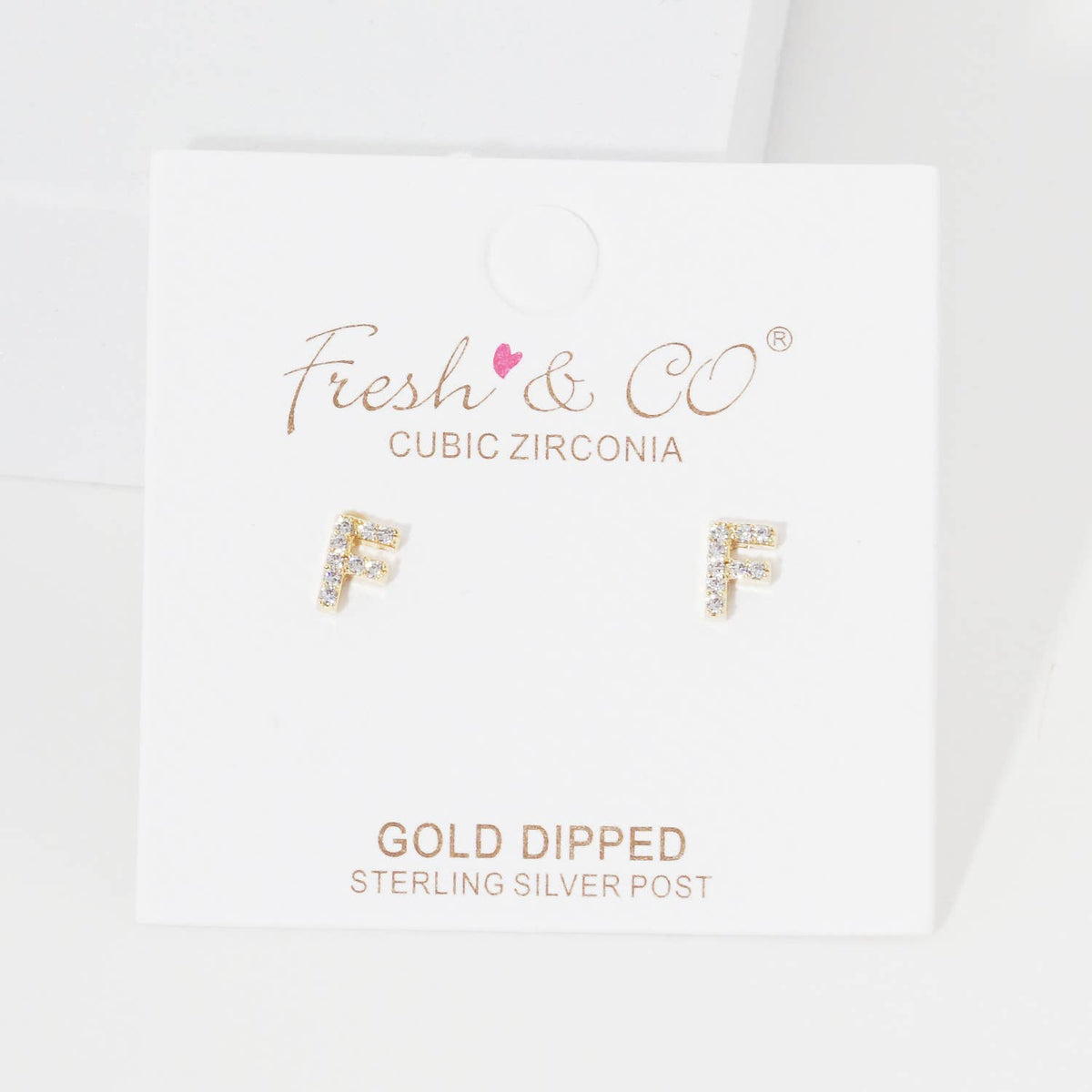 Cubic Zirconia Initial Stud Earrings.
