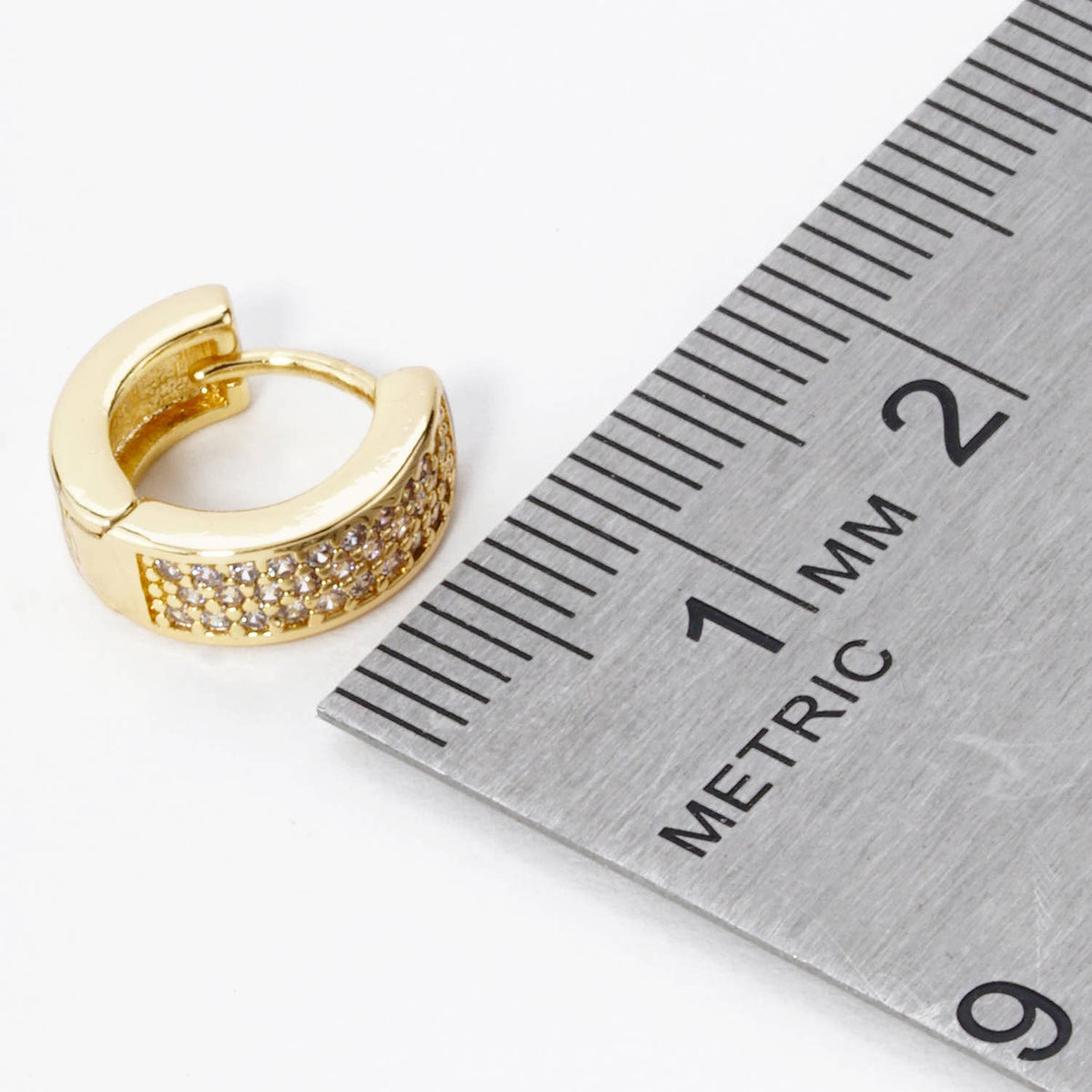 3 LINE MICRO PAVE SET CUBIC ZIRCONIA 10MM HUGGIE HOOP.