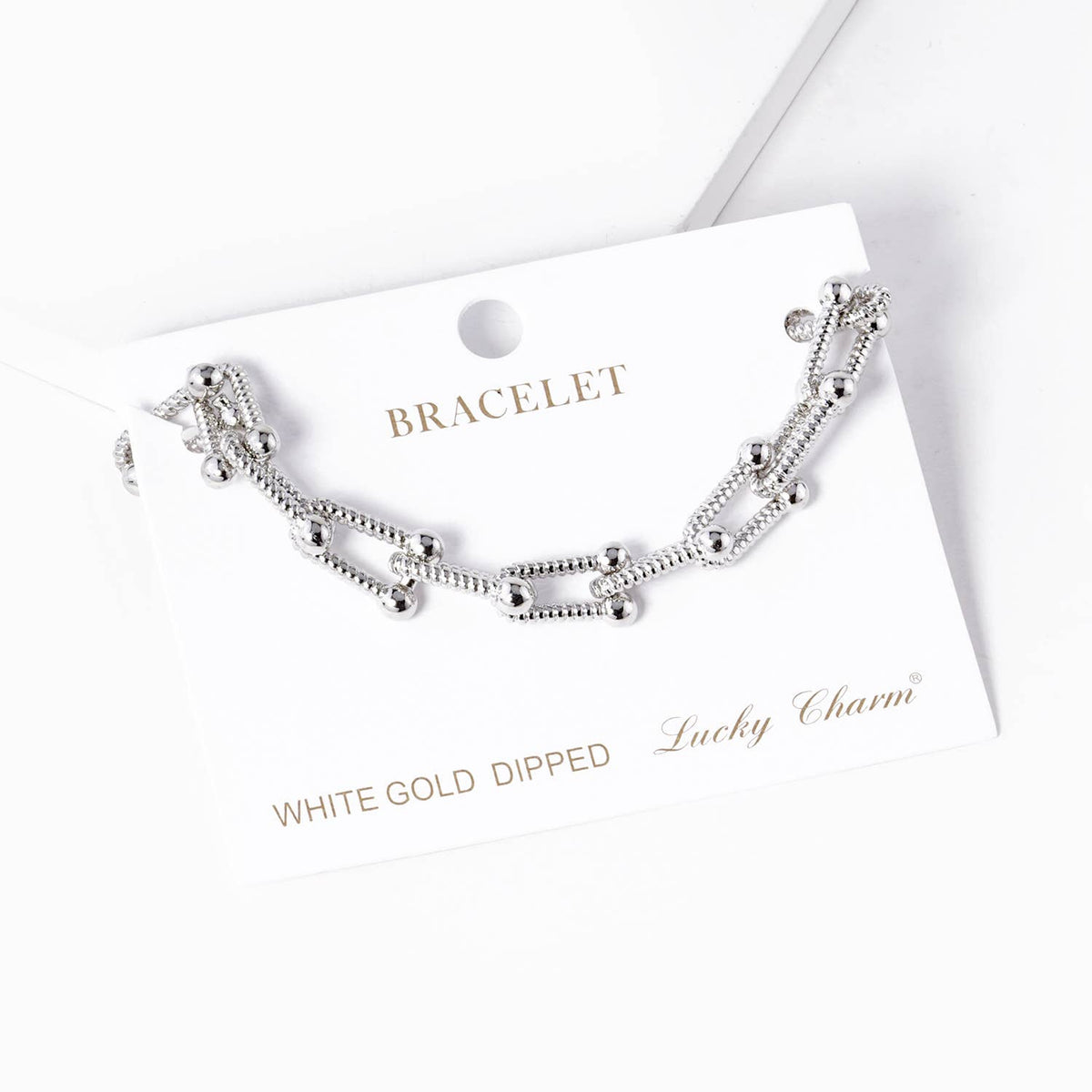 Modern U-Link Statement Bracelet with Polished Bead Accents