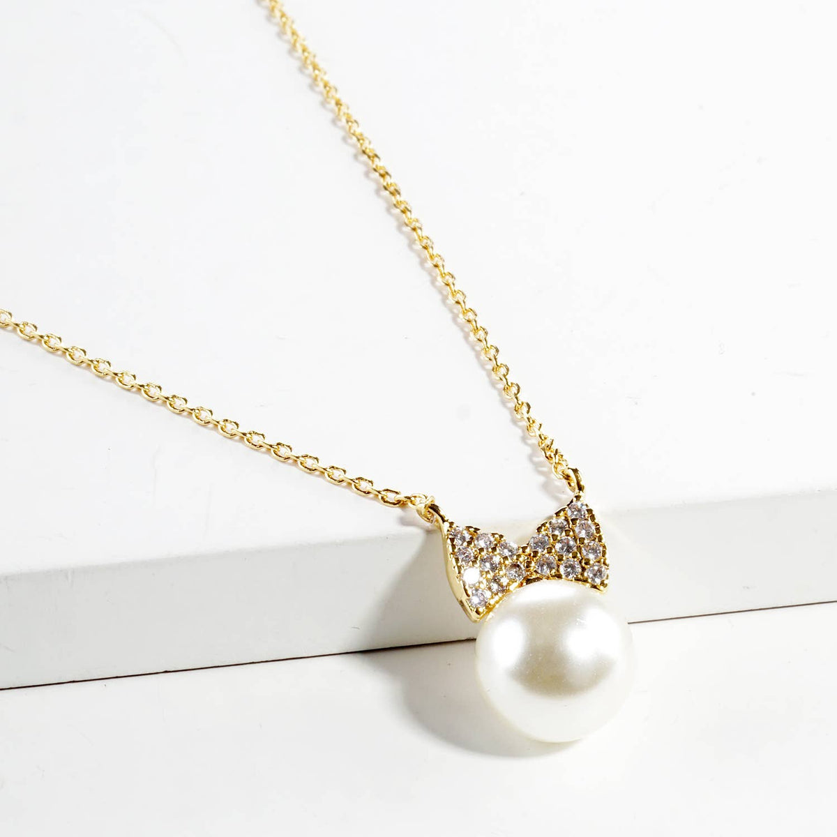 Elegant Bow & Pearl Pendant Necklace