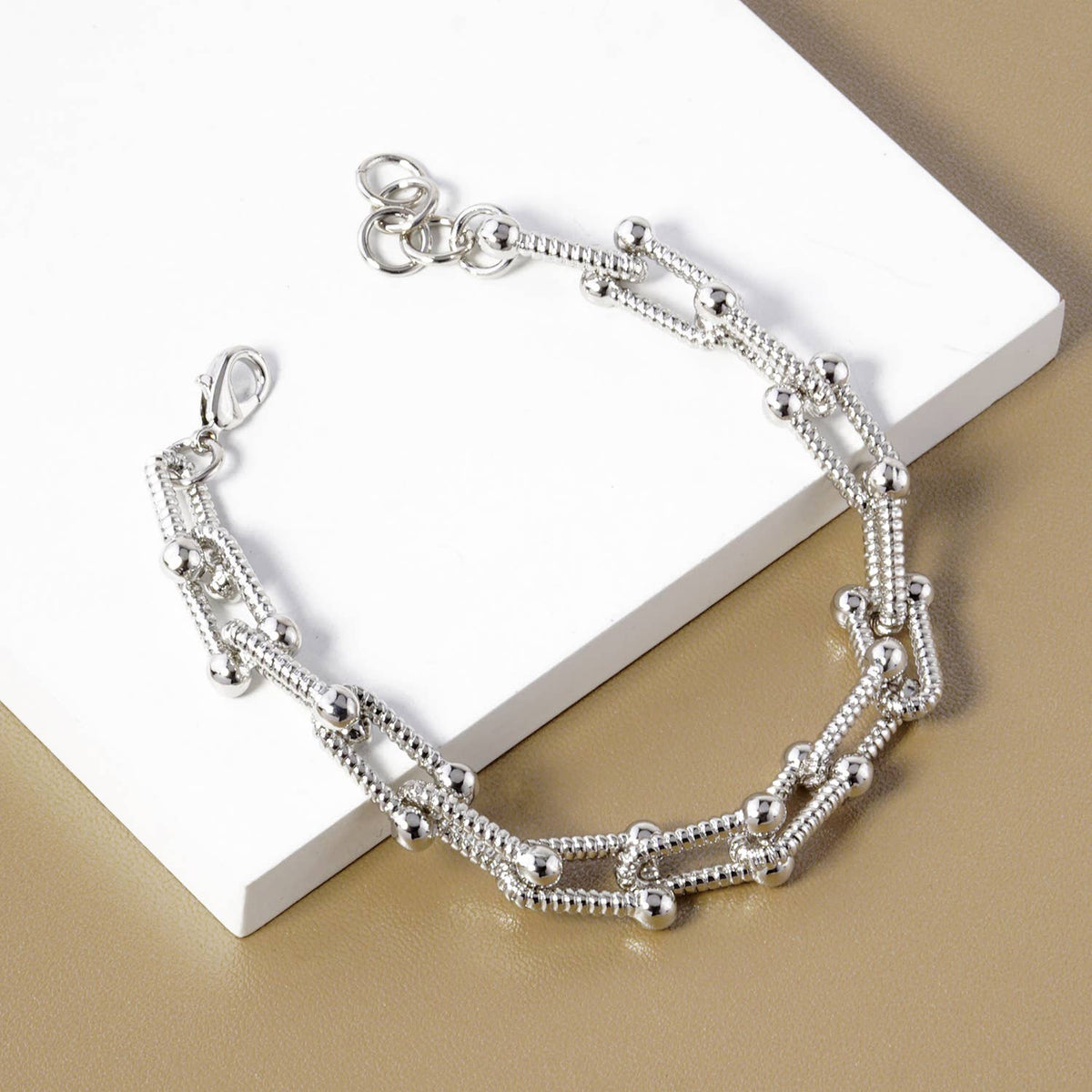 Modern U-Link Statement Bracelet with Polished Bead Accents