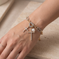 Mixed Metal Cross & Pearl Charm Bracelet