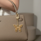 Elegant Filigree Butterfly Bag Charm