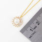 Vintage-Inspired Pearl Sunburst Halo Pendant Necklace