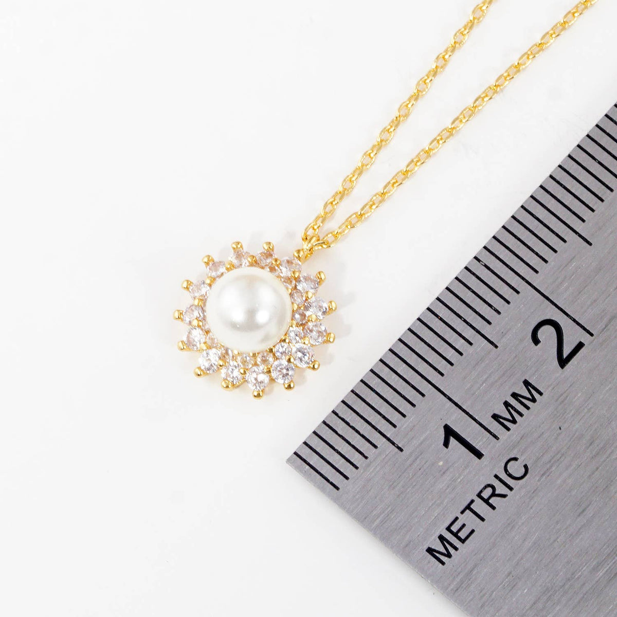 Vintage-Inspired Pearl Sunburst Halo Pendant Necklace