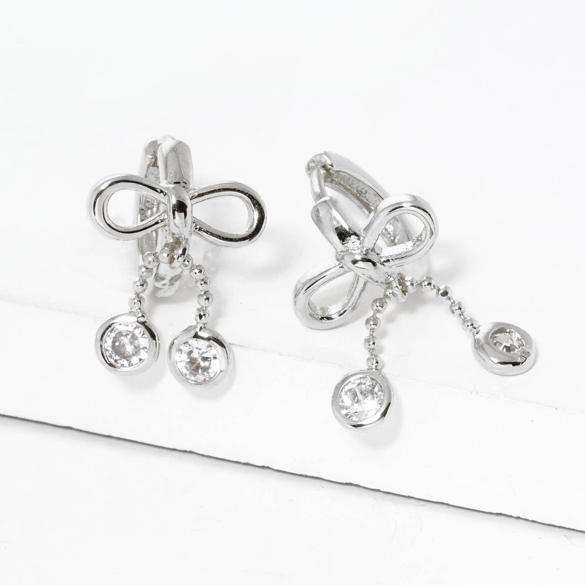 Dainty Bow & Cubic Zirconia Dangle Huggie Hoops