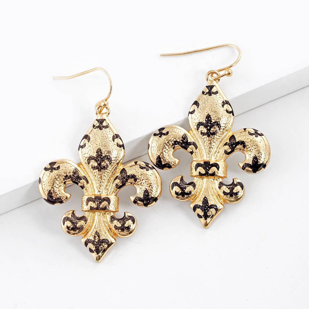 Gold Plated Black Spotted Fleur De Lis Dangle Earrings