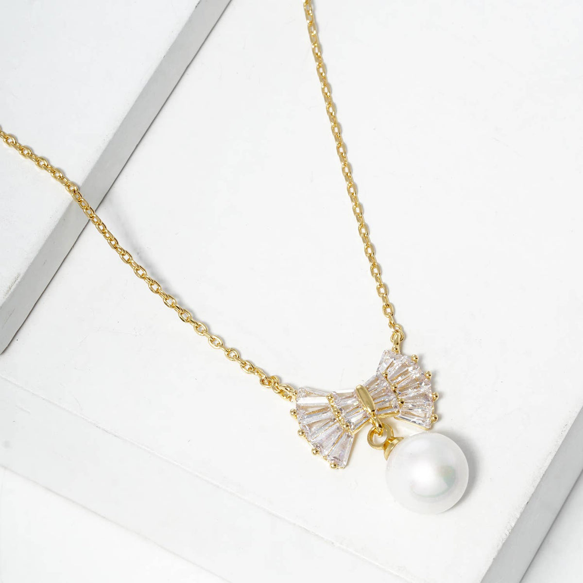 Cubic Zirconia Bow and Pearl Drop Pendant Necklace
