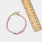 Pink Ribbon Braided Bracelet – Gold-Dipped Awareness Charm