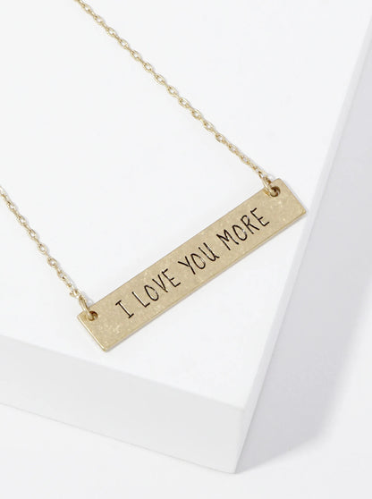 I Love You More Engraved Horizontal Bar Pendant Necklace