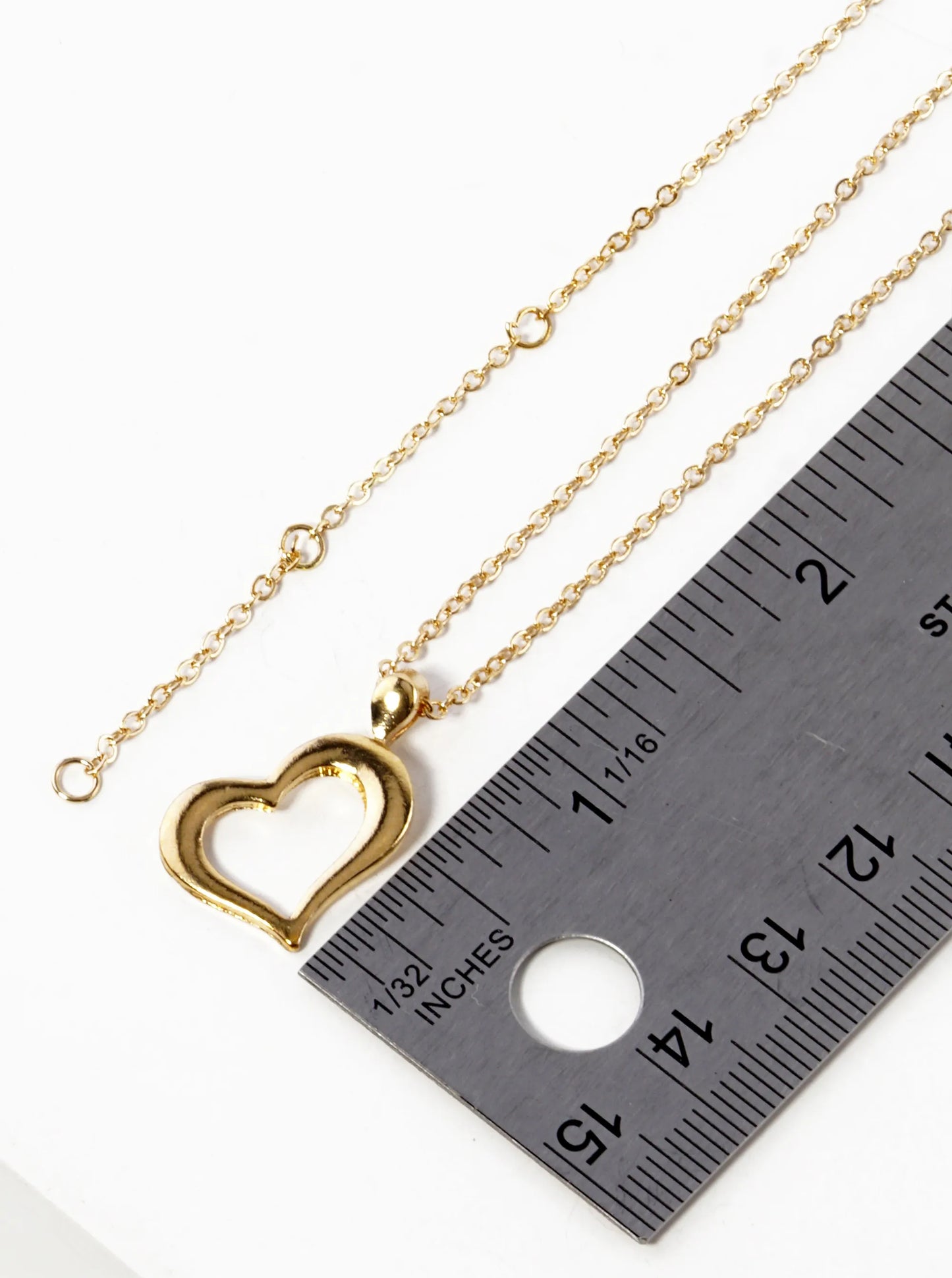 Polished Metal Sideways Heart Pendant Necklace