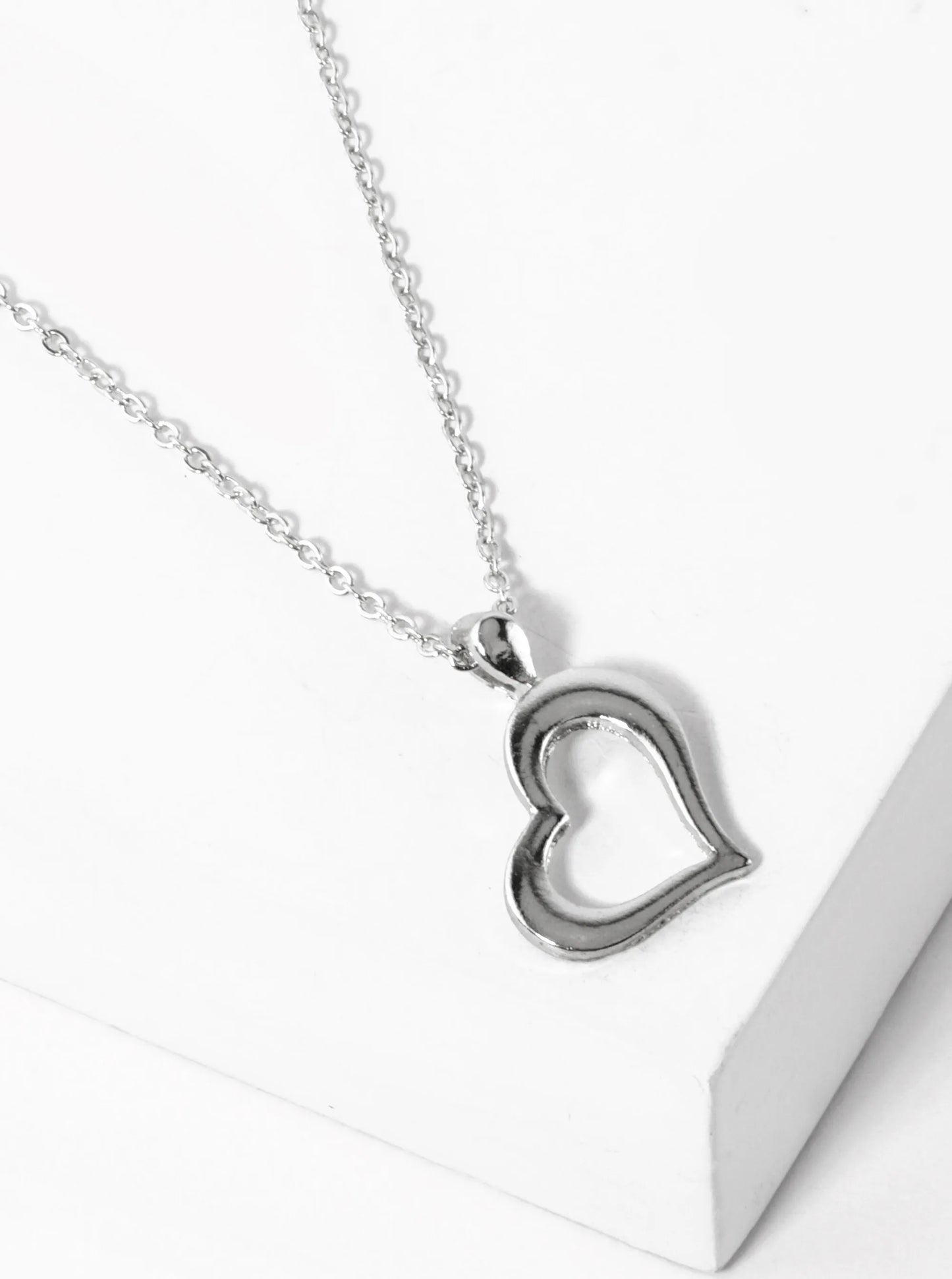 Polished Metal Sideways Heart Pendant Necklace