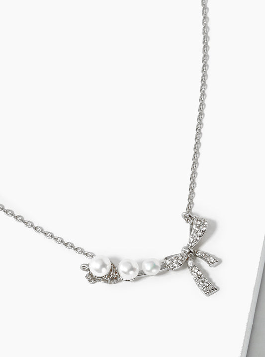 White Gold Dipped CZ Pave Ribbon Bow Pearl Pendant Necklace