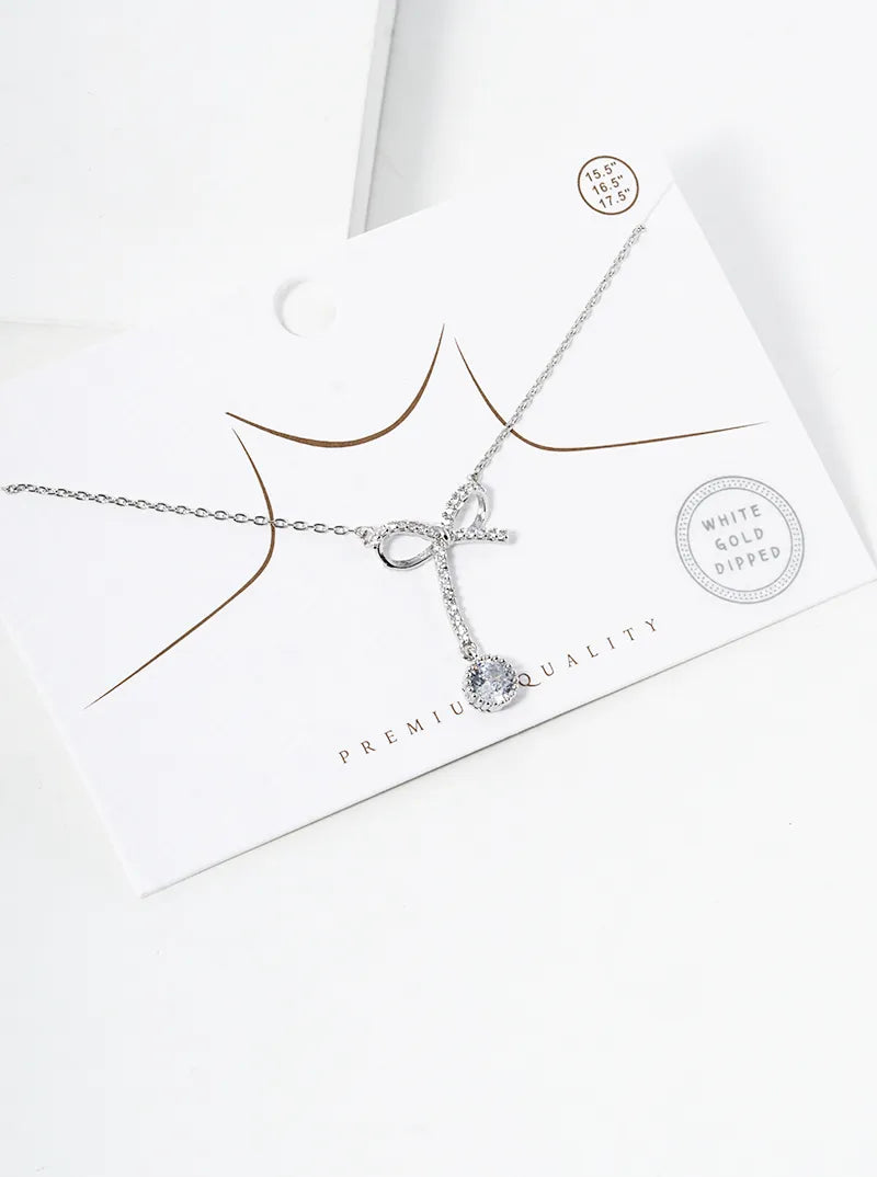 White Gold Dipped CZ Pave Ribbon Bow Pendant Necklace