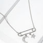 18k Gold Dipped Safety Pin With Star And Moon Drop Pendant Necklace