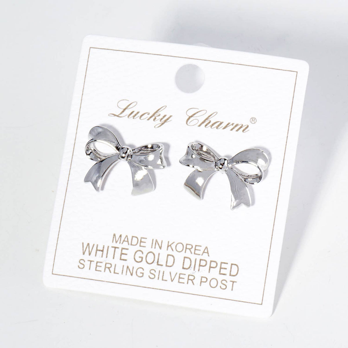 Ribbon Bow Stud Earrings / 18K Gold Dipped Brass.