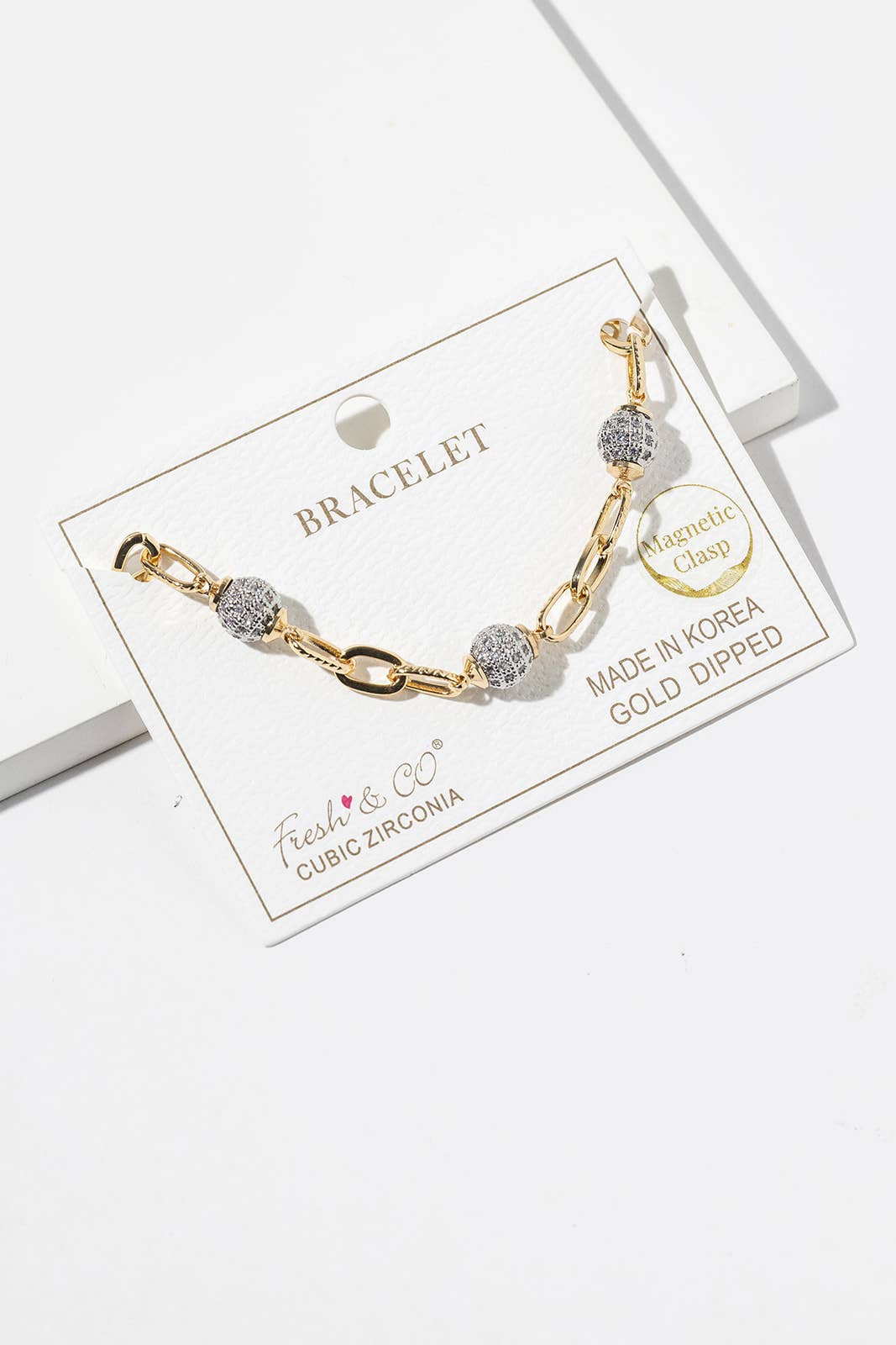Two-Tone Gold Dipped Link Bracelet with Cubic Zirconia Pavé