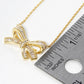 Elegant Pavé Crystal Bow Pendant Necklace