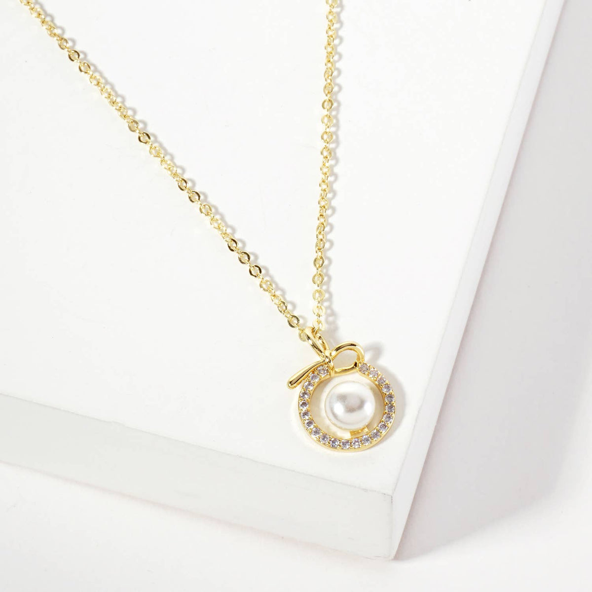 Center Pearl Point Pave-Set Circle Bow Pendant Necklace
