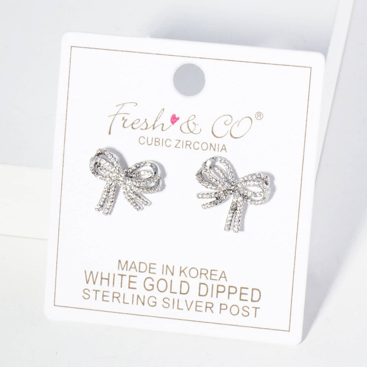 Micro Pave Set Cubic Zirconia Ribbon Bow Stud Earrings
