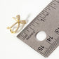 Pave-Set CZ 15mm Bow Open Huggie Hoop Earrings