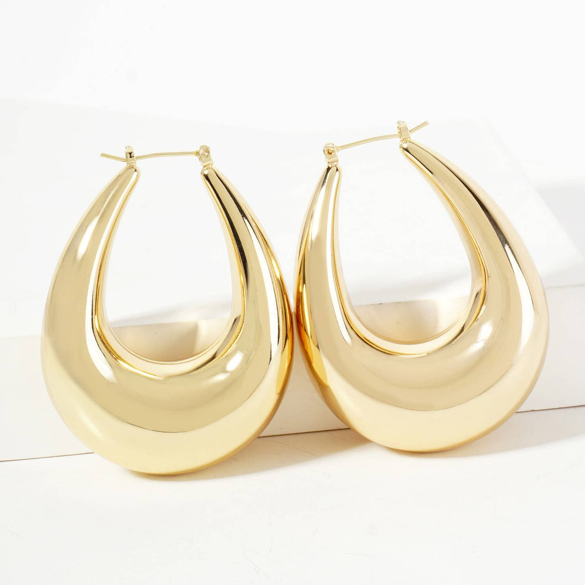 Polished Brass Hollow Tapered Teardrop Tube Hoop Earrings