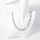 Polished Brass Interwoven Chain Necklace